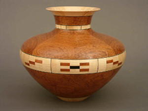 Vase of bubinga (an African wood), maple, and ebony. Ten inches tall.